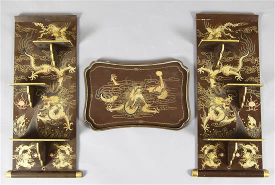 A pair of Chinese travelling shelves and a similar tray